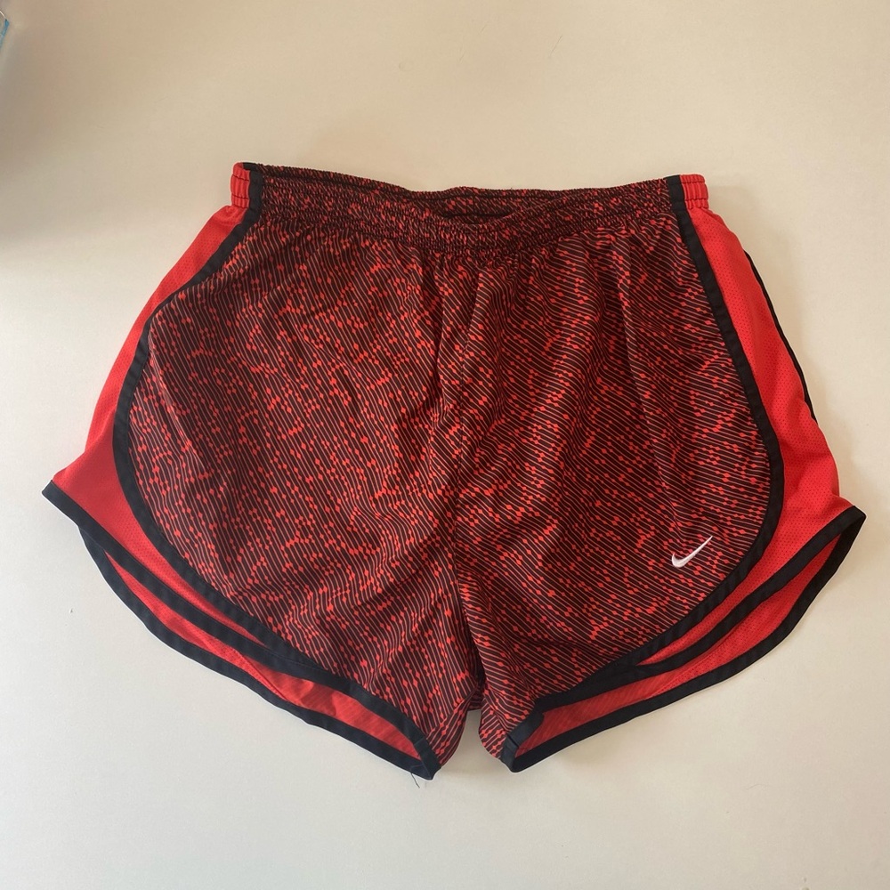 red Nike Dri-Fit shorts